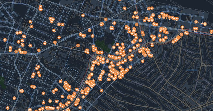Map of Allston with a dense trail of moving-permit pins along the Commonwealth Avenue corridor.